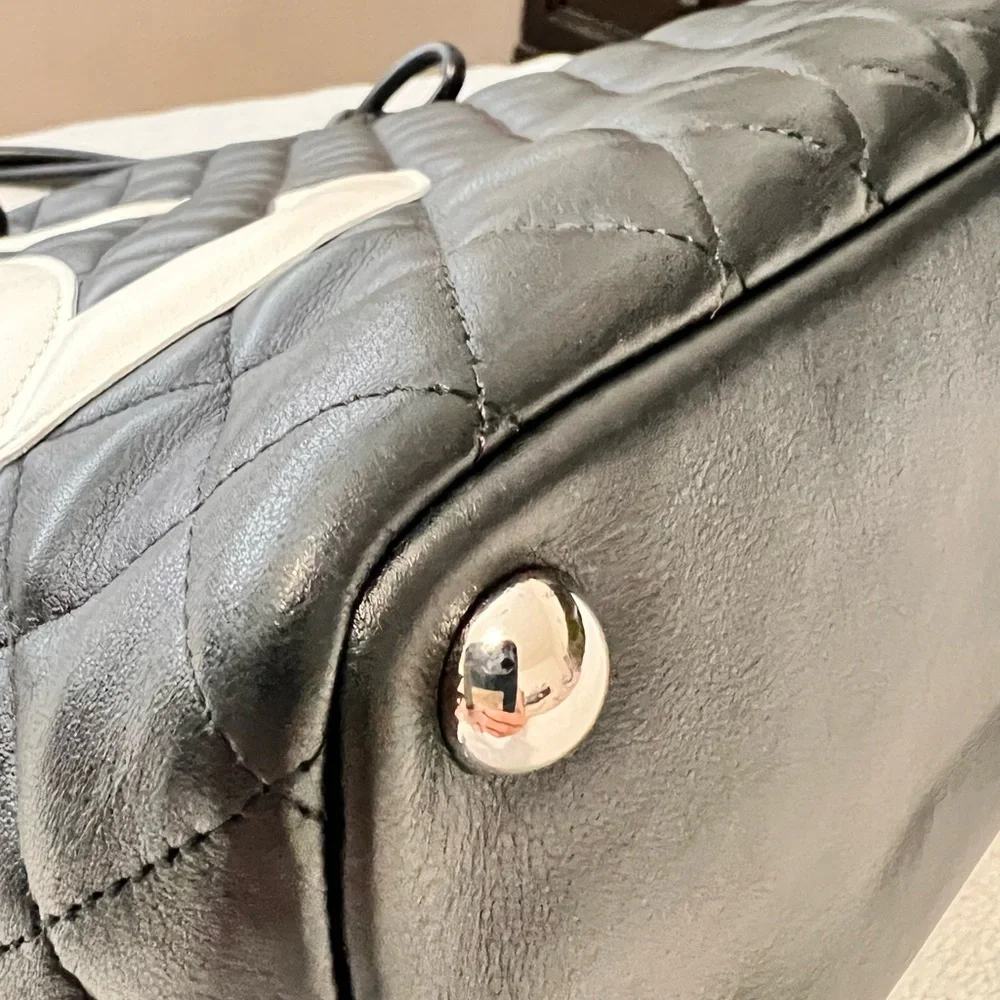 CHANEL Black Quilted Leather Shoulder Tote with White CC Emblem